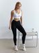 З ДЕФЕКТОМ Лосини спортивні безшовні з ефектом push up чорні M V-shape