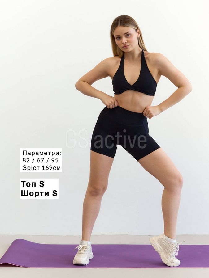 Топ спортивний з відкритою спинкою з чашечками чорний L Fit 1460 top фото Топ спортивний з відкритою спинкою з чашечками чорний L Fit 1460 top фото